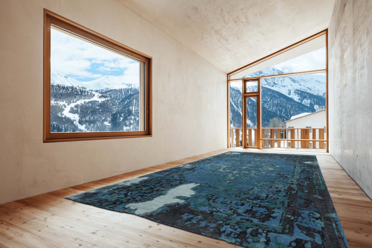 Wohnraum in den Bergen mit toller Aussicht und Geba Teppich " Antique blue" - Geba Teppich