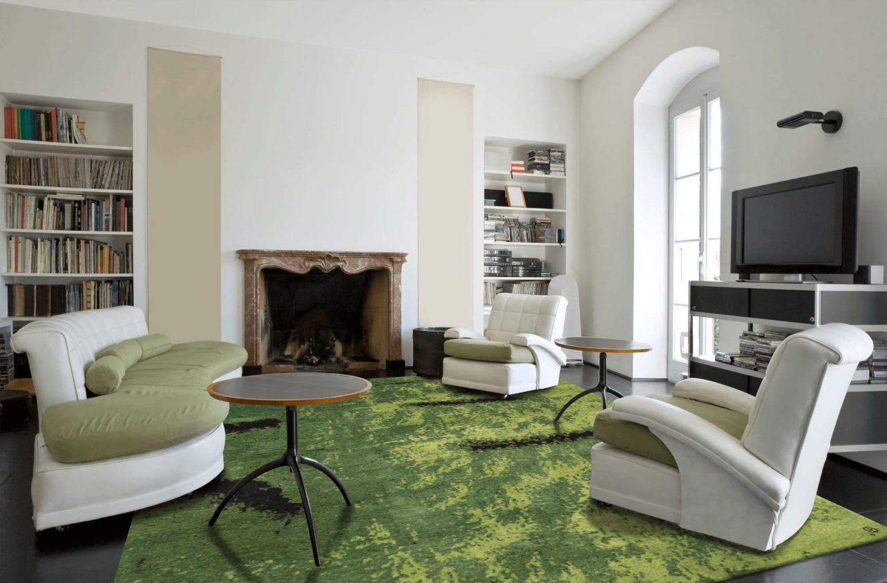 Wohnzimmer mit grünem Geba Teppich "Euphorbia" - Geba Teppich