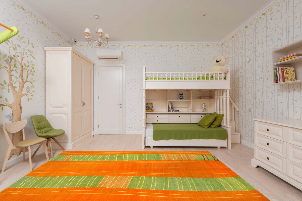 Kinderzimmer mit orange-grünem Geba Teppich "Sitra" - Geba Teppich