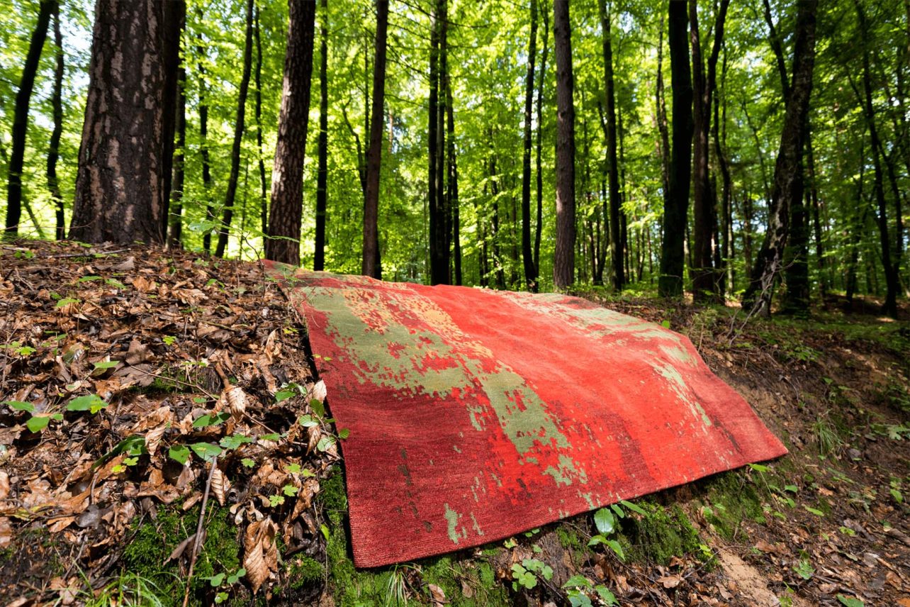 Wald mit rotem Teppich Suemo mit grünem Muster - Geba Teppich