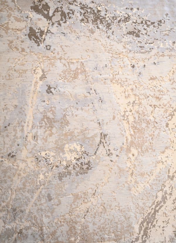 Geba Teppich "Morano beige" in unterschiedlichen beige-grau Tönen, mit einigen blass-lilanen Akzenten, abstraktes Muster mit markanter dunkelgrauen Ecke, aus Nepal, 100 Knoten, gefertigt aus tibetischer Schafwolle - Produktbild - Geba Teppich